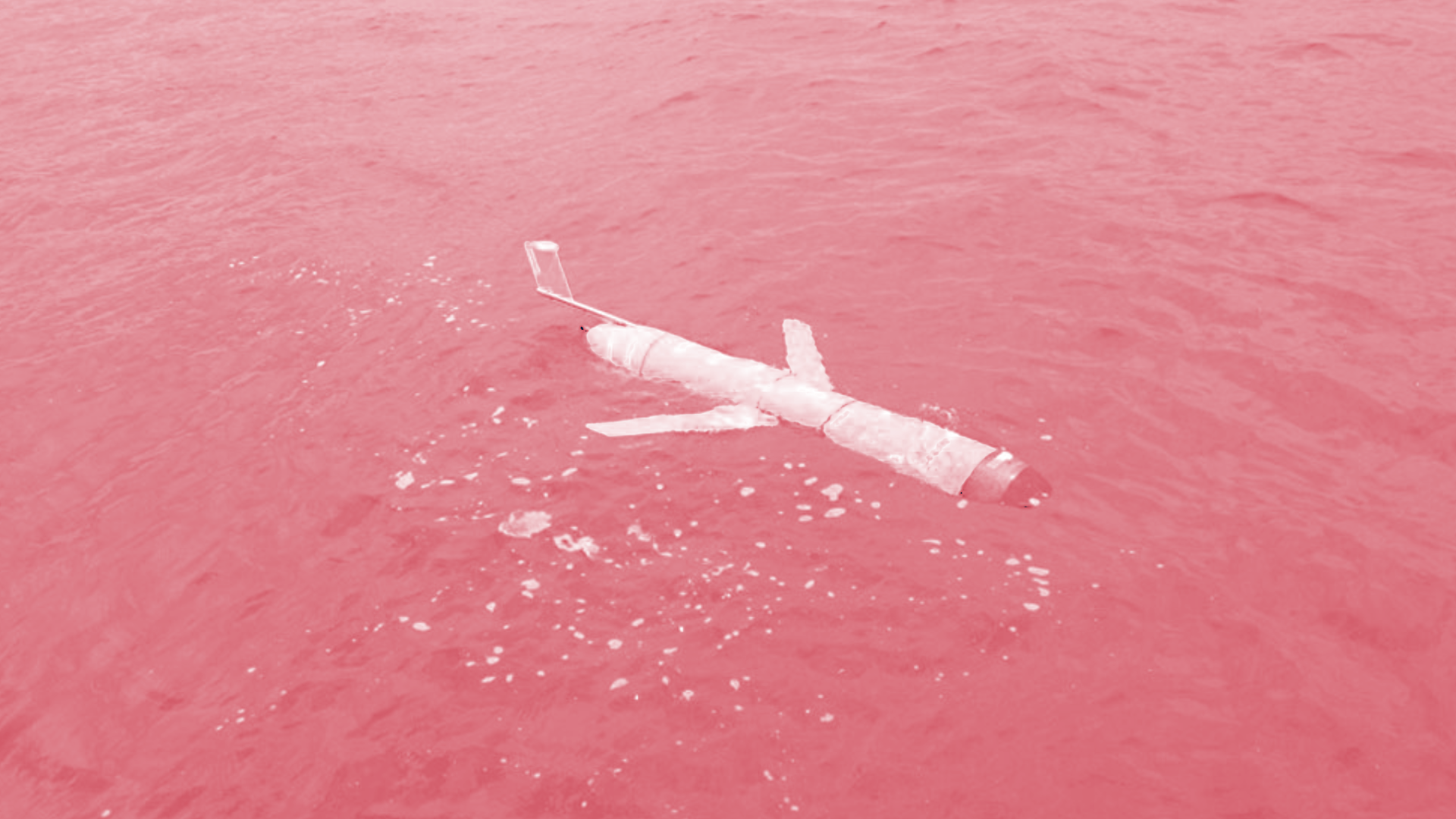 Stylized image of an ocean glider used for underwater research floating in the ocean.